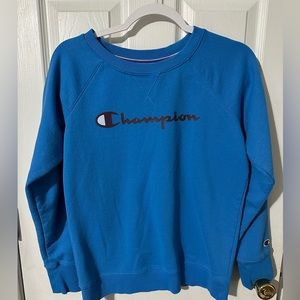 Women’s Champion crewneck sweatshirt.  Color: blue. Size: LG